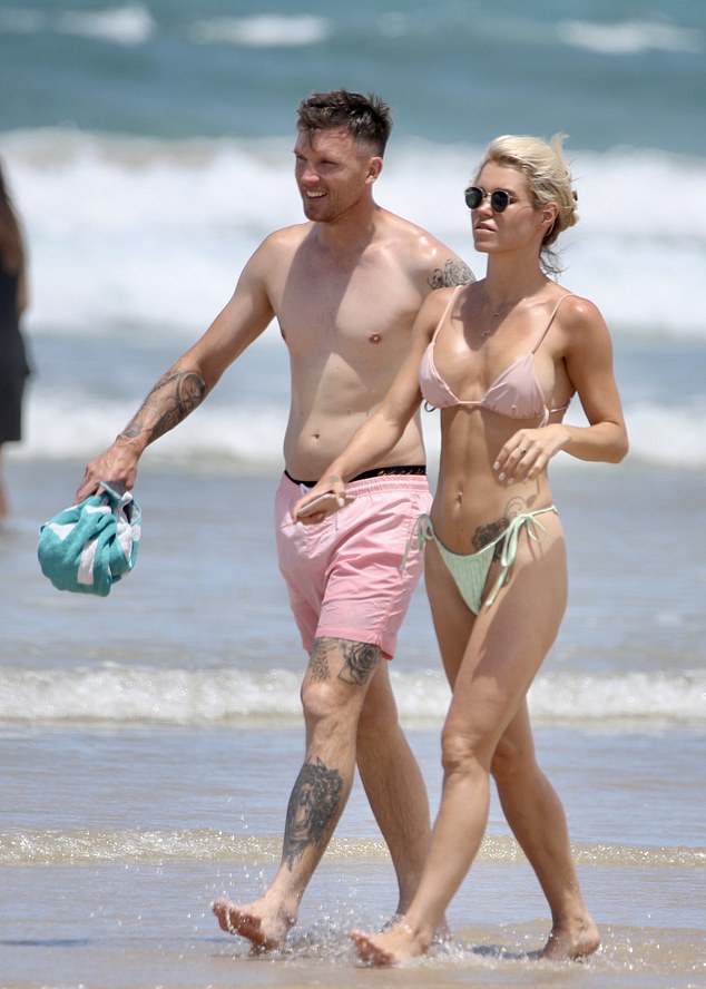 Bachelors Simone Ormesher and Matt Thorne flaunts his bikini body at Surfers Paradise