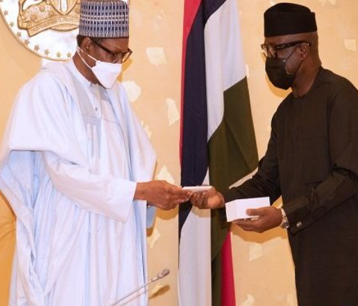 Buhari takes delivery of first made in Nigeria cell phone