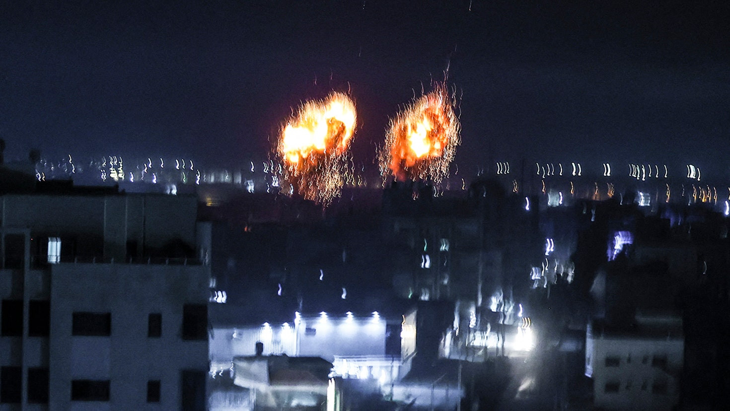 Gaza violence restarts as Israel fires airstrikes at Hamas targets after fire balloons are dropped on Israeli territory