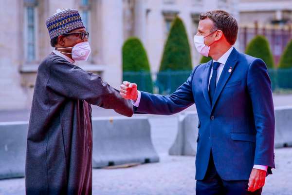 Buhari Reacts As French President Gives Fresh Appointment To Nigerian Billonaire