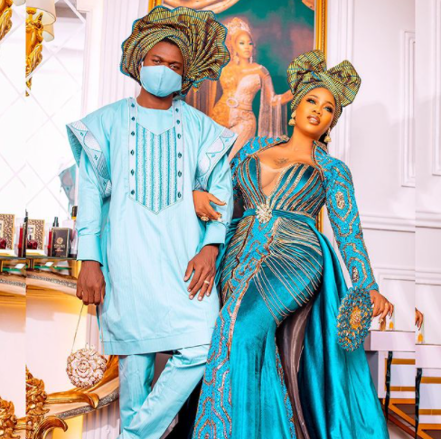 Toyin Lawanis husband Segun Wealth wears gele with his traditional outfit